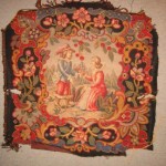 A tapestry with two people in the middle of it