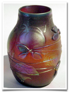 An iridescent vase with tendril-like designs