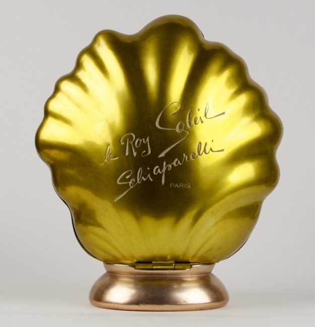A gold shell with the names of people who have passed away.