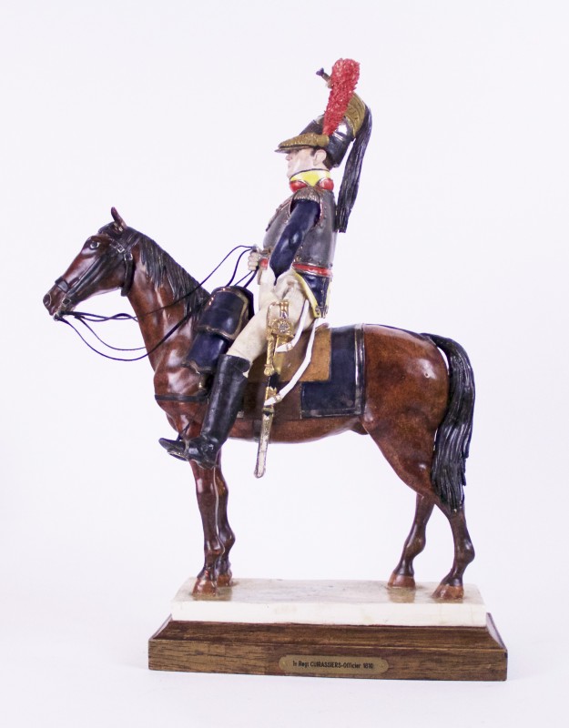 A statue of a man on horseback with a sword.