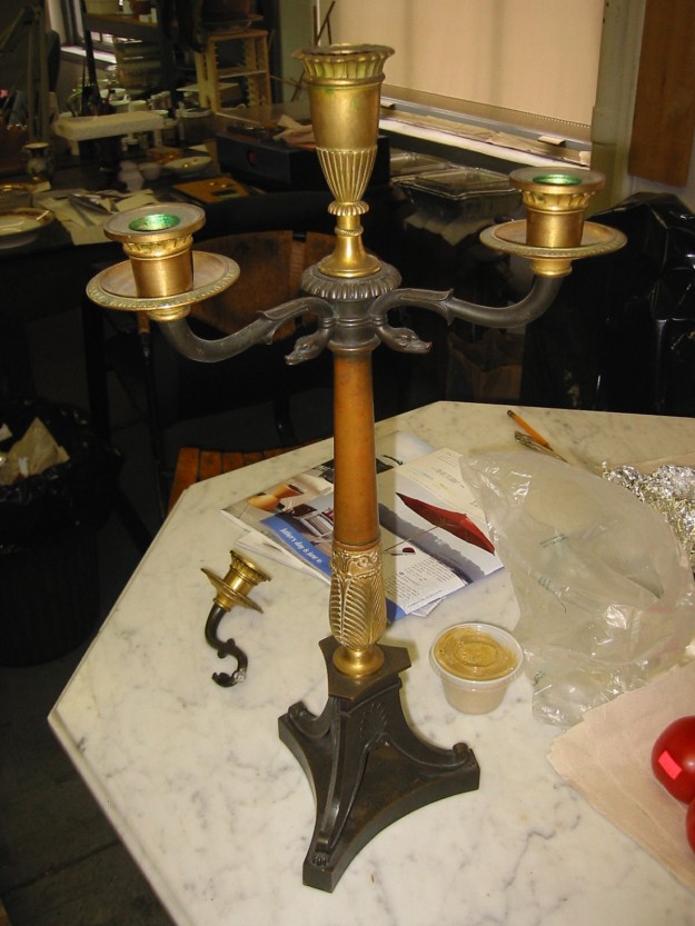 A table with two candles on it